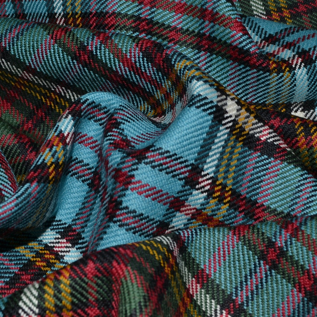  Heavyweight tartan fabric from Yorkshire Fabric, featuring a robust plaid pattern with rich colors, ideal for creating durable, warm garments such as kilts and jackets with a classic, timeless appeal.