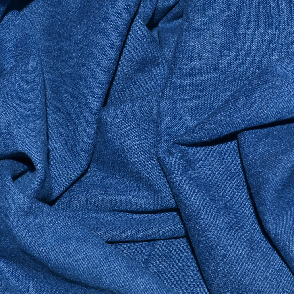 Denim fabric from Yorkshire Fabric, known for its robust texture and classic blue hues, ideal for crafting durable and stylish garments like jeans, jackets, and skirts with a timeless, casual appeal.