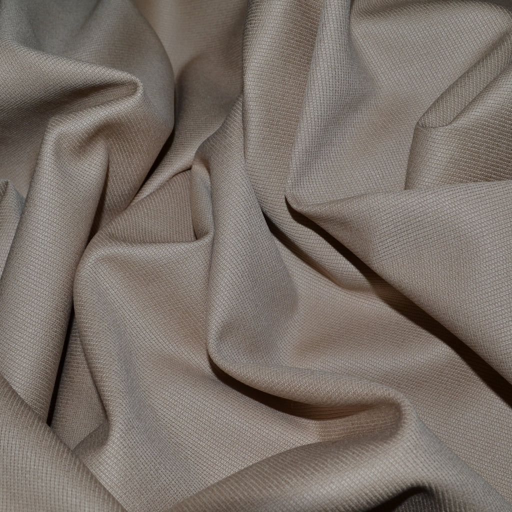 Cavalry twill fabric from Yorkshire Fabric, featuring a distinctive diagonal weave and robust texture, ideal for creating durable, elegant garments such as tailored trousers and jackets with a classic, structured appearance.