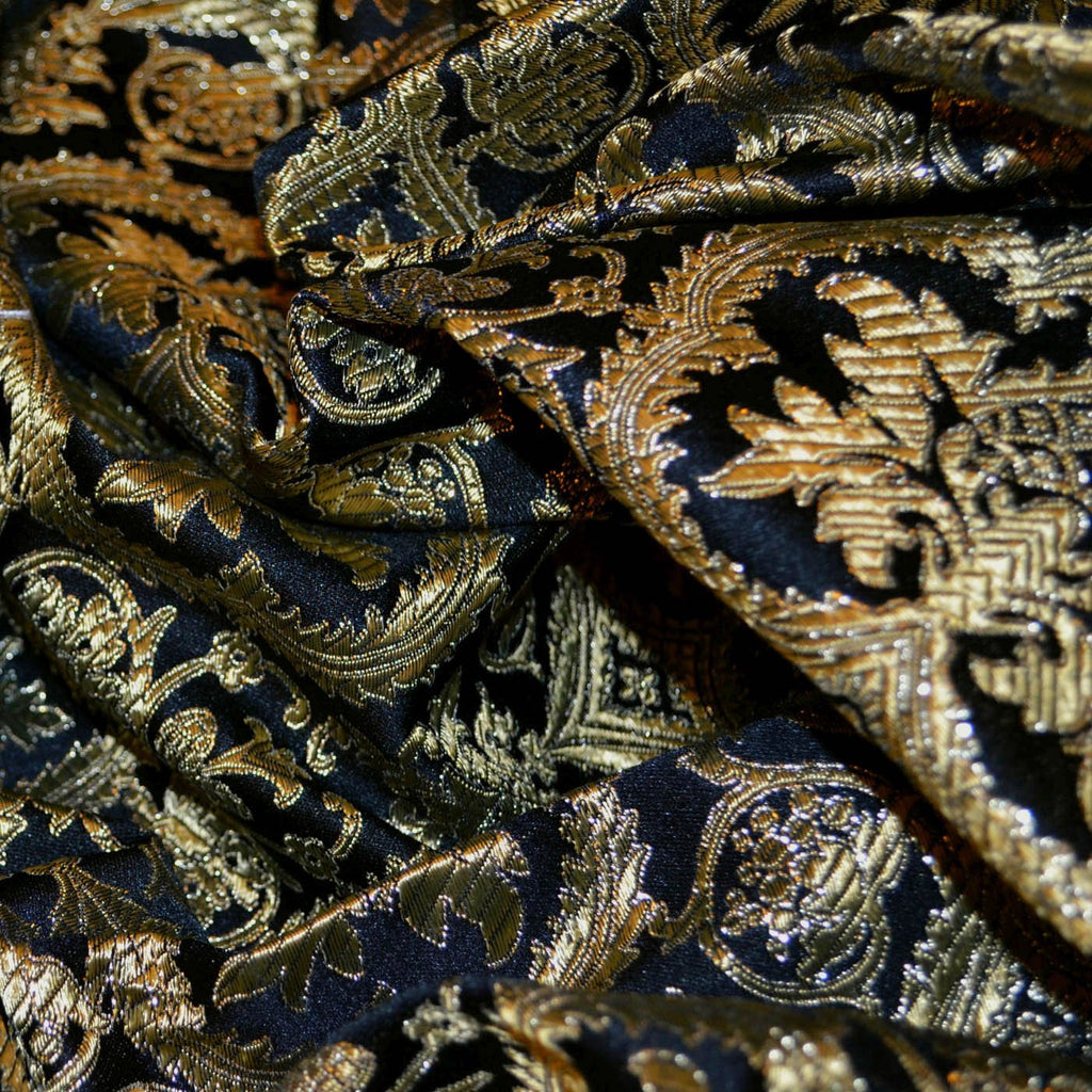 Jacquard and brocade fabrics from Yorkshire Fabric, showcasing intricate woven patterns and rich textures. Jacquard features detailed designs with a smooth surface, while brocade offers opulent, raised patterns, ideal for crafting elegant garments.