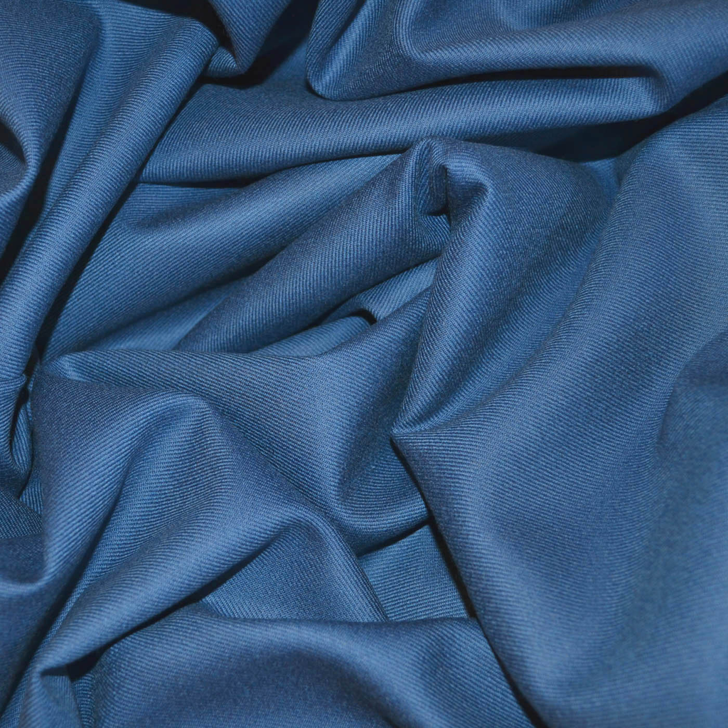 All wool suiting fabric from Yorkshire Fabric, offering a luxurious feel and excellent drape, perfect for crafting high-quality, elegant tailored suits with warmth, durability, and a refined finish.