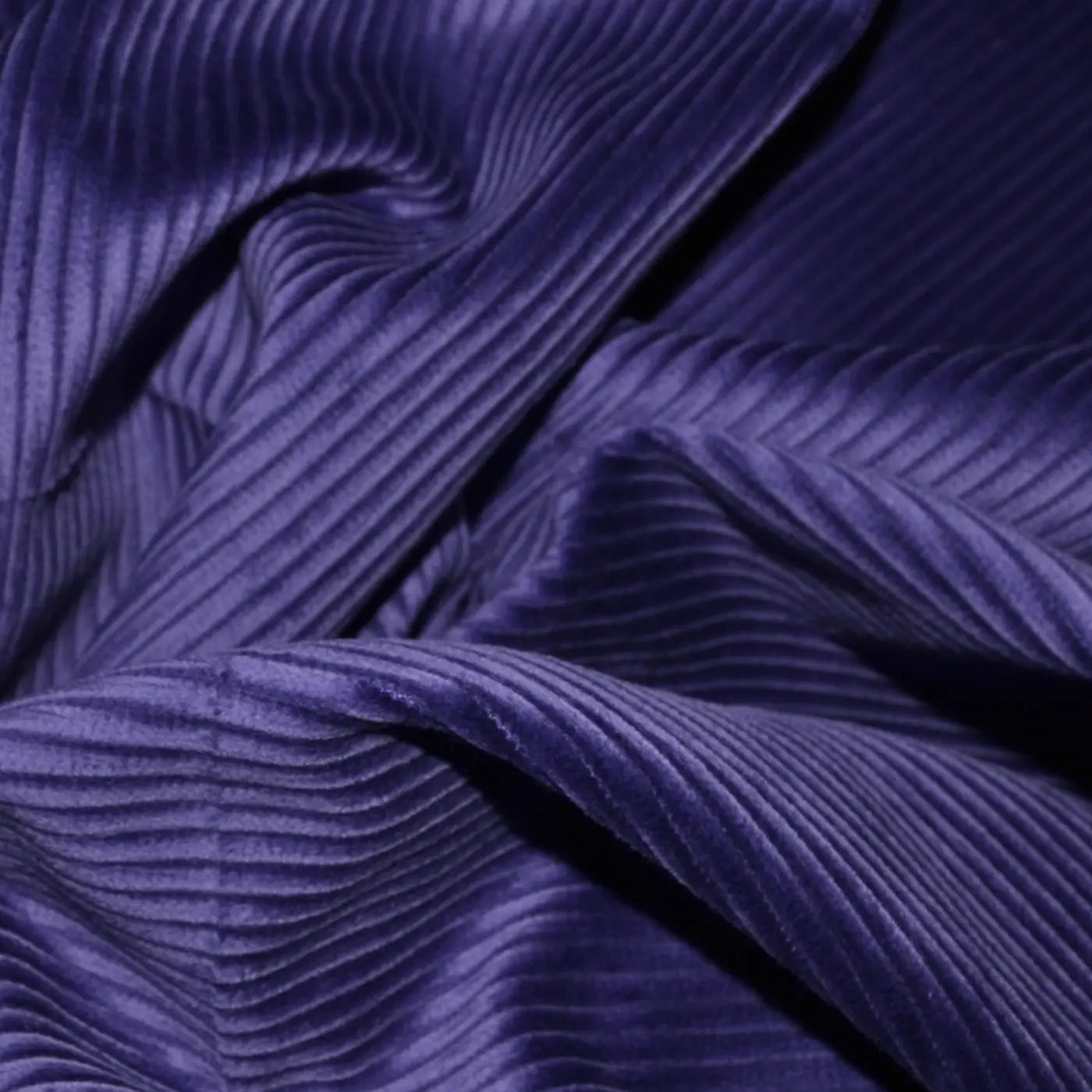 Corduroy fabric from Yorkshire Fabric, featuring distinctive ribbed texture and durability, ideal for creating stylish and comfortable garments like trousers, jackets, and skirts with a classic, cozy feel.