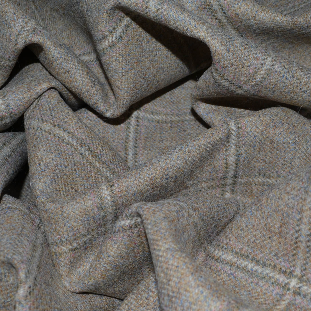 Check pattern fabric from Yorkshire Fabric, featuring a classic grid design with varying color contrasts, ideal for creating stylish garments and accessories with a versatile and timeless appeal.