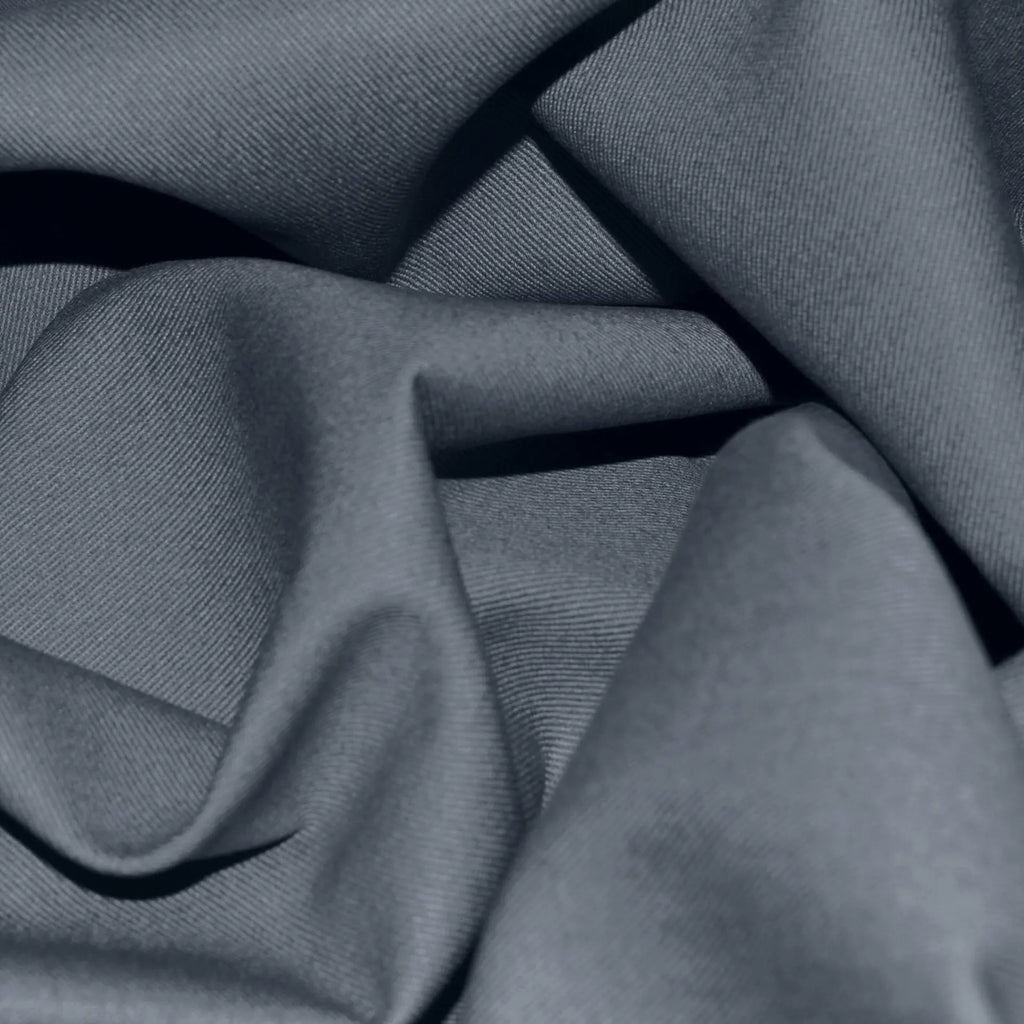 Close-up of cotton jacketing fabric showing its soft texture and refined finish. Ideal for creating stylish, comfortable jackets and outerwear in a range of versatile colors.