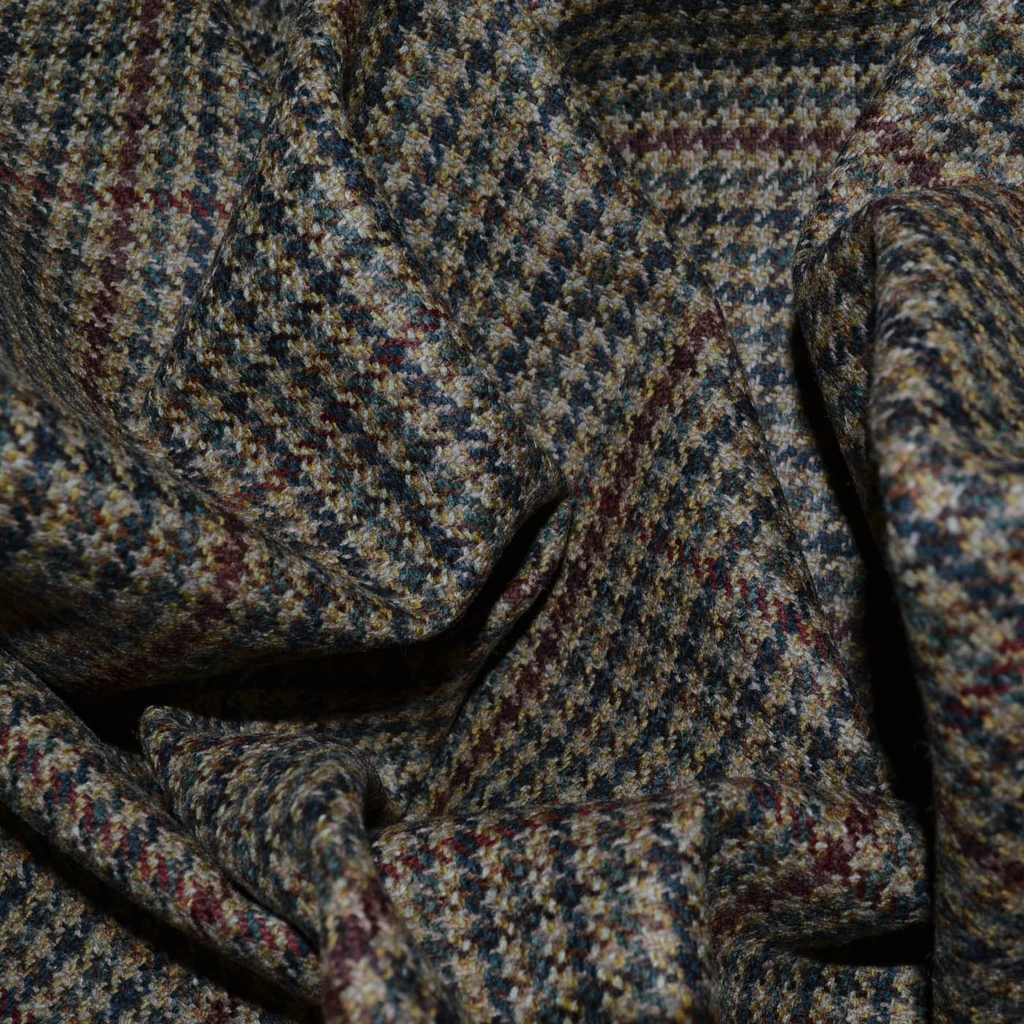 Dogtooth fabric from Yorkshire Fabric, featuring a distinctive pattern with sharp, zigzagging shapes, ideal for creating classic, sophisticated garments and accessories with a bold, timeless design.